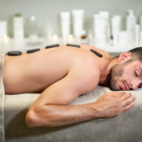 Man enjoying hot stone massage